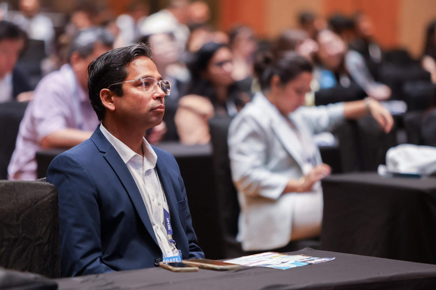 Man attentively listening at business conference