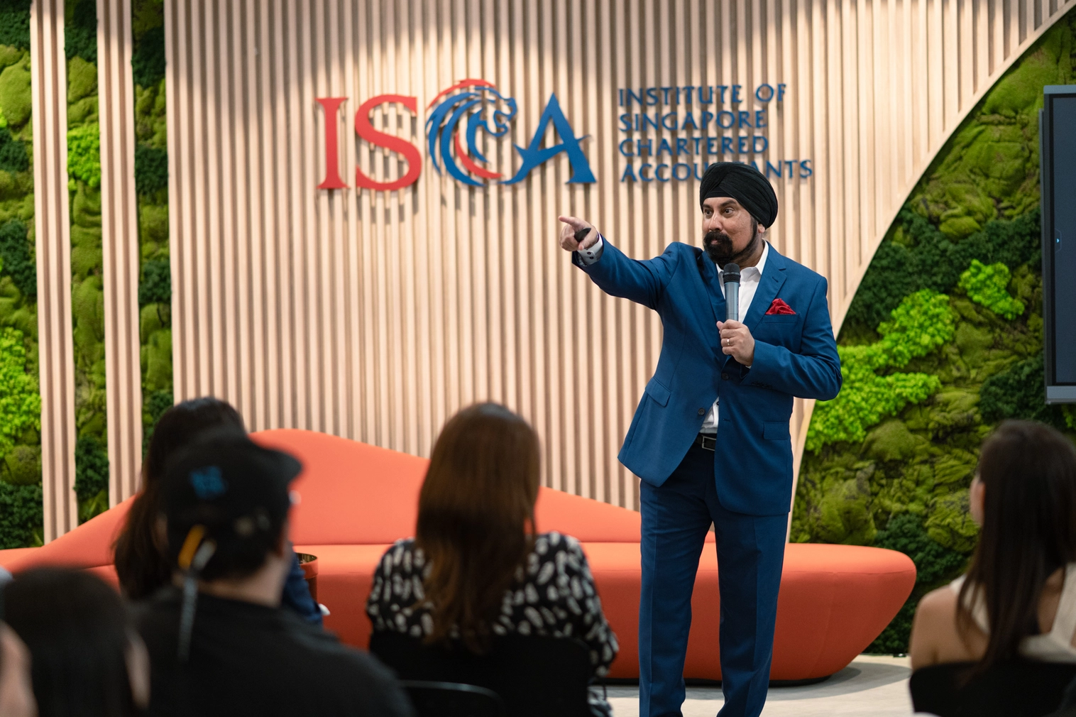 Speaker presenting at ISCA branding seminar